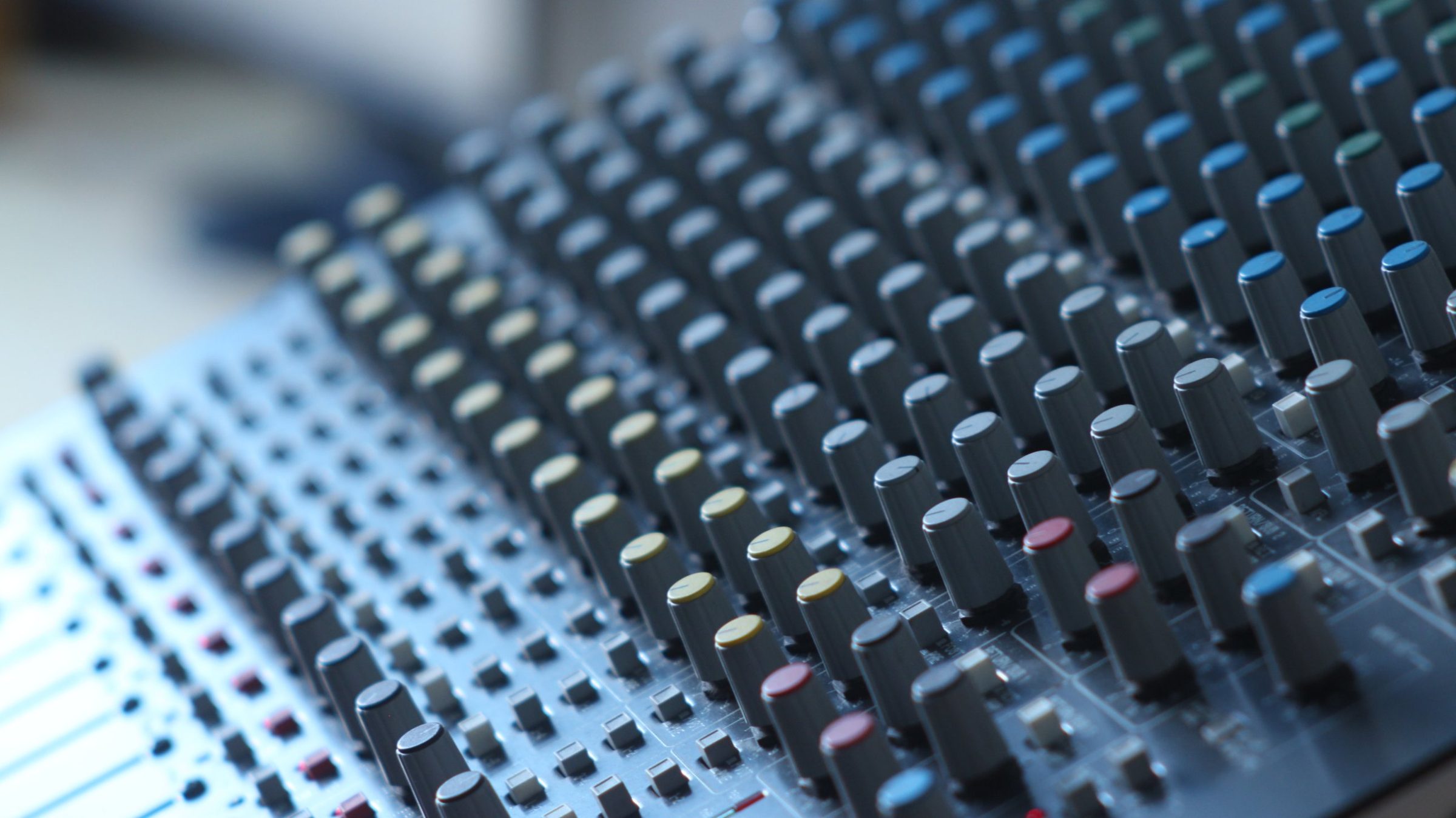 Close-up of the knobs on a mixing desk